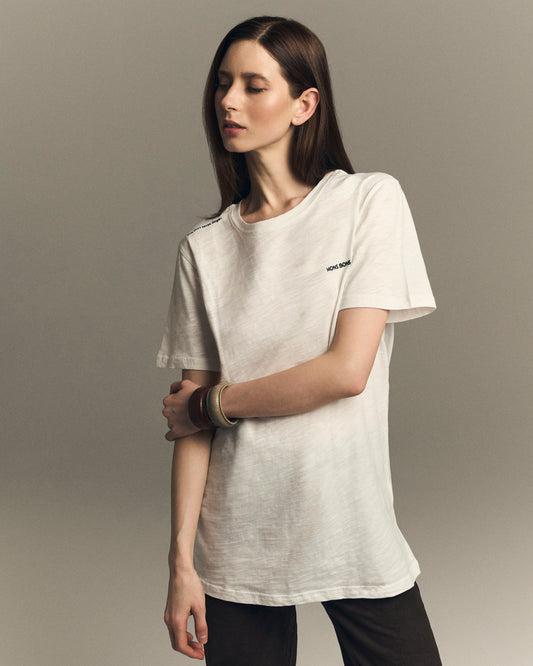 "This Shirt Saves Dogs." OVERSIZE T-shirt – Beyaz